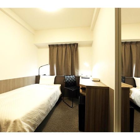 Sendai Business Hotel Ekimae Buitenkant foto