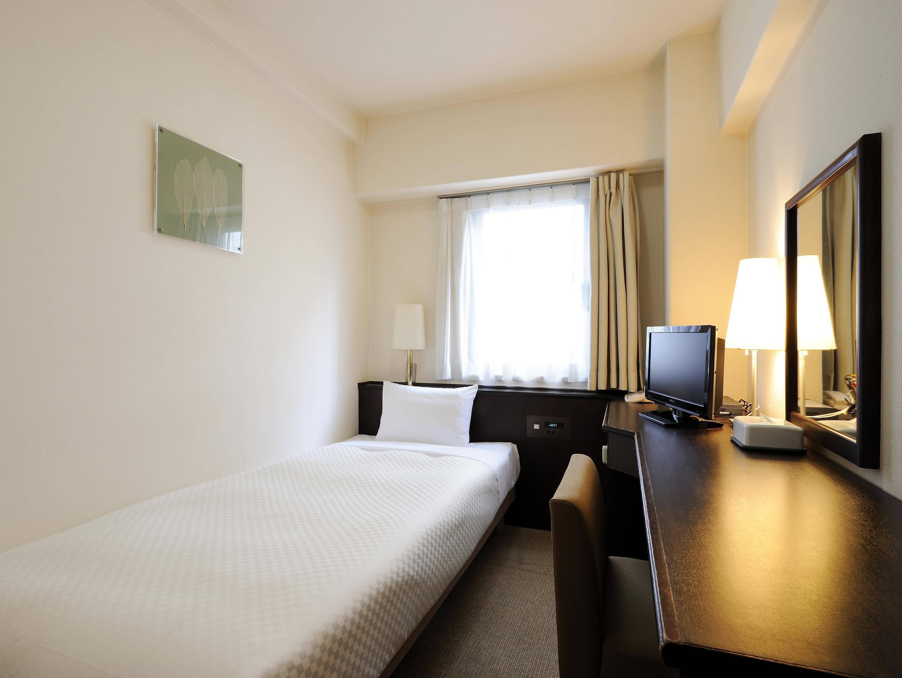 Sendai Business Hotel Ekimae Buitenkant foto