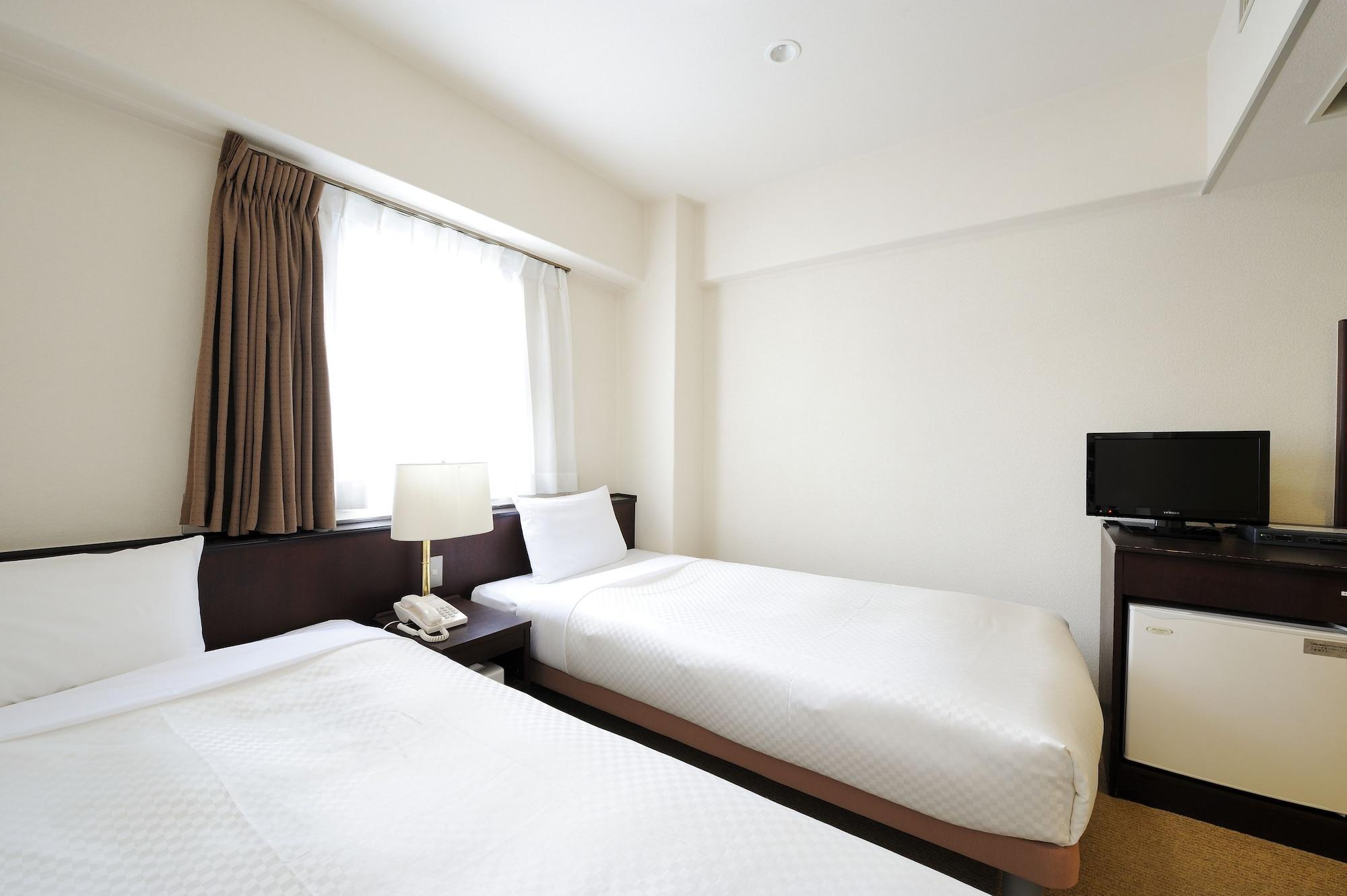 Sendai Business Hotel Ekimae Buitenkant foto