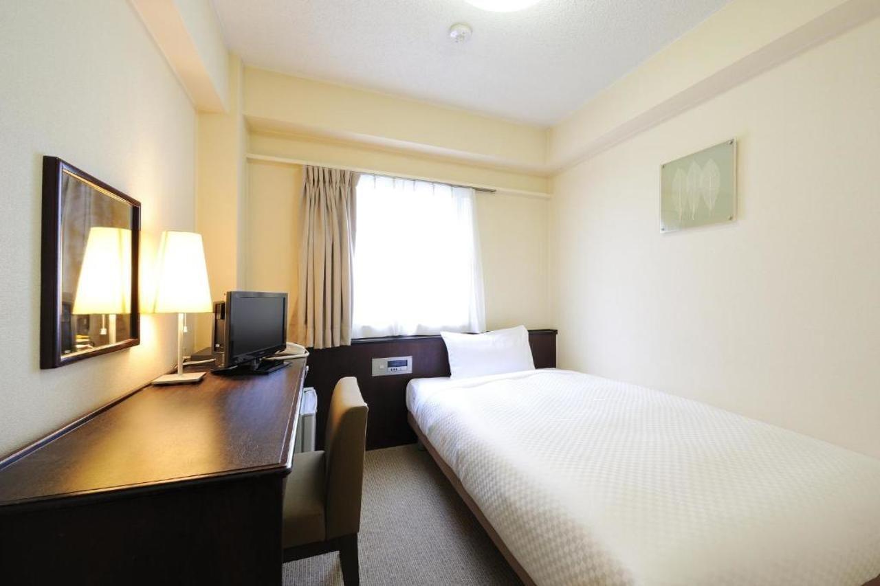 Sendai Business Hotel Ekimae Buitenkant foto