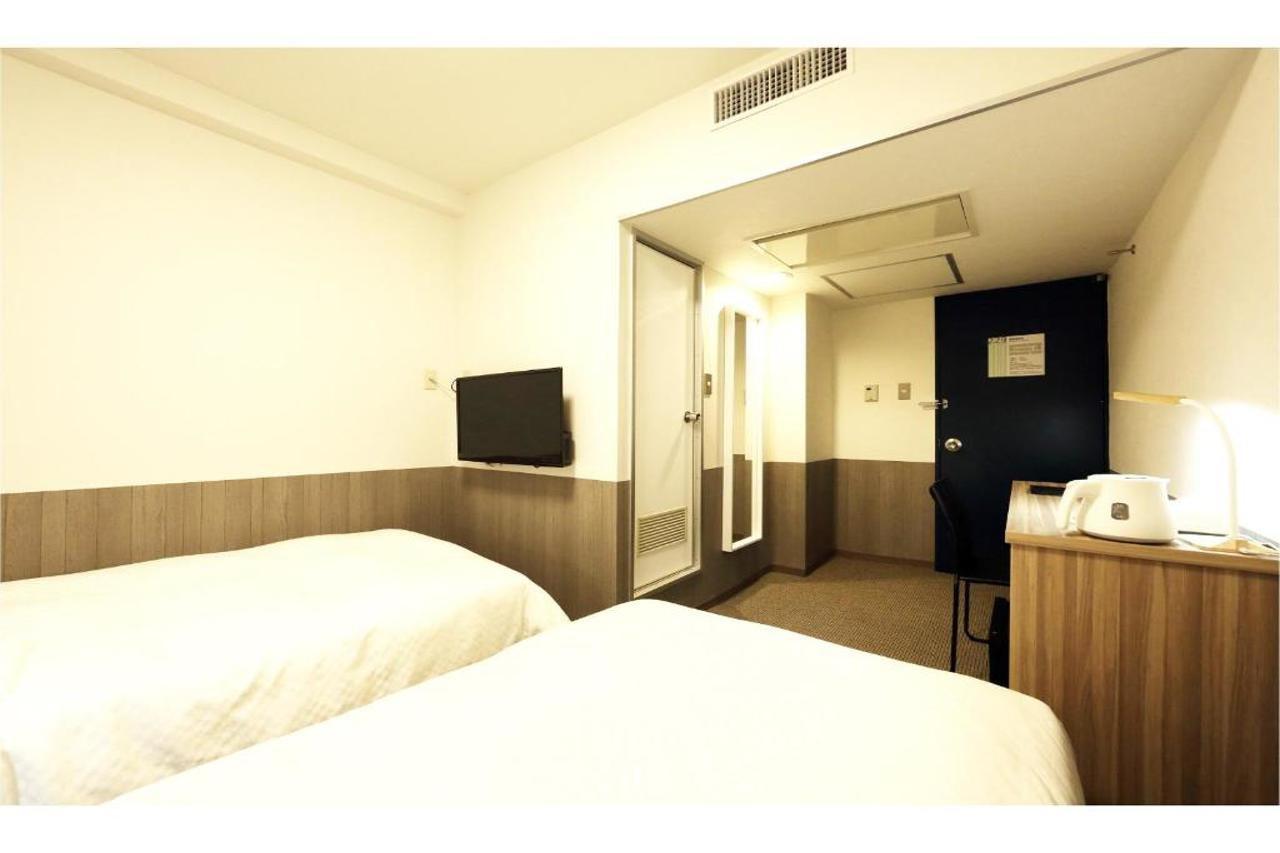 Sendai Business Hotel Ekimae Buitenkant foto