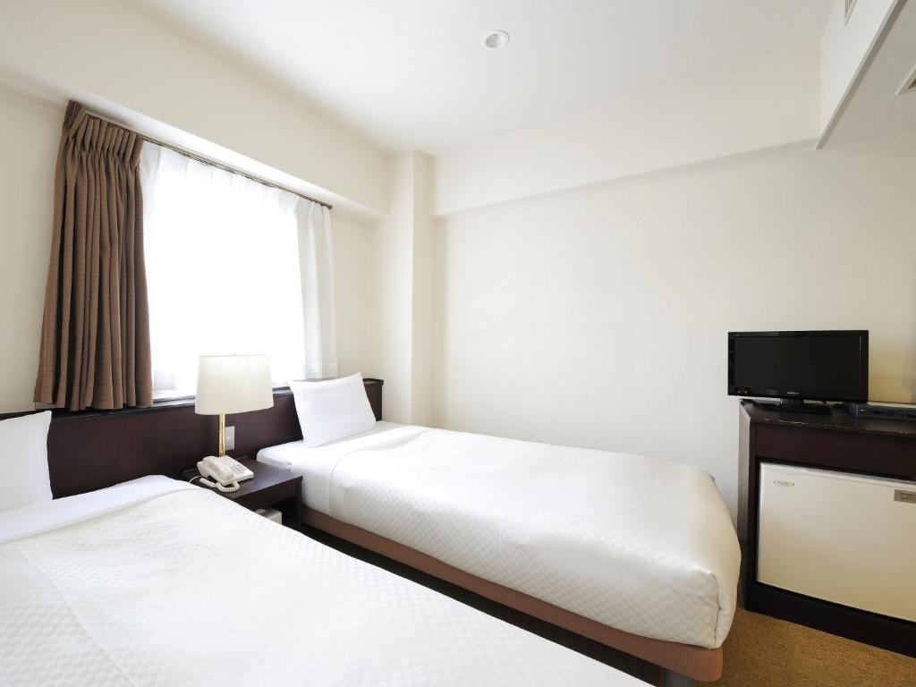 Sendai Business Hotel Ekimae Kamer foto