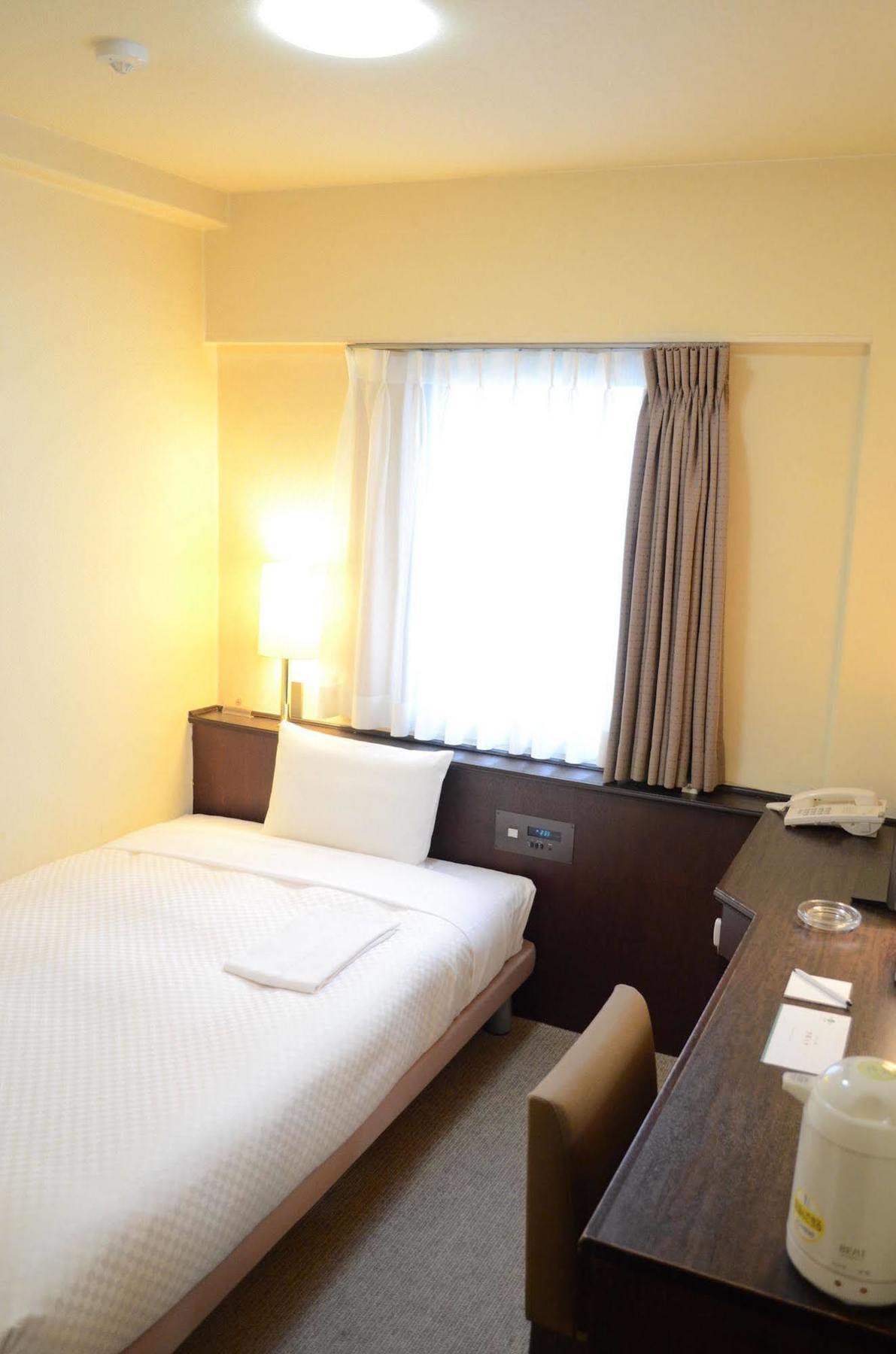 Sendai Business Hotel Ekimae Buitenkant foto