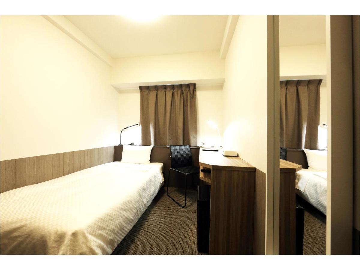 Sendai Business Hotel Ekimae Buitenkant foto