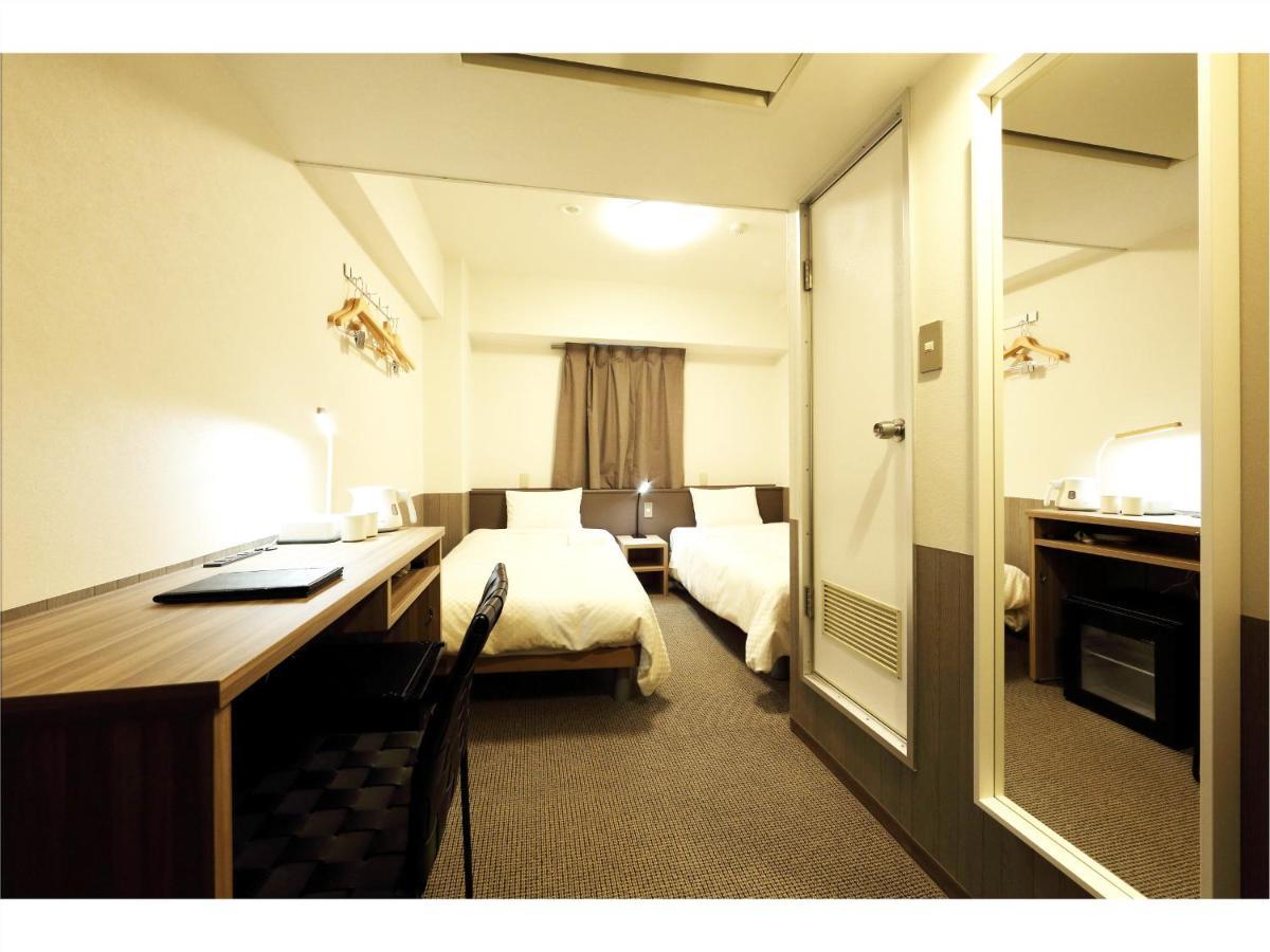 Sendai Business Hotel Ekimae Buitenkant foto